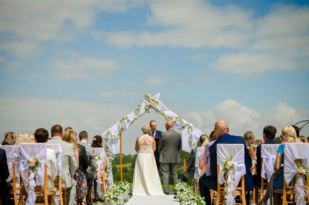 a group of people at a wedding ceremony