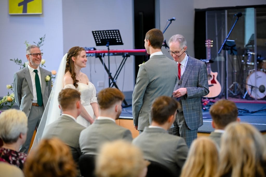 a man and woman in a wedding ceremony