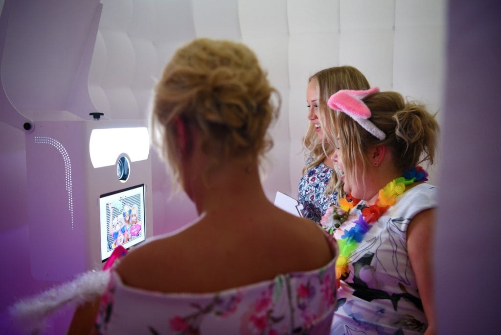 a group of women wearing bunny ears and flowers