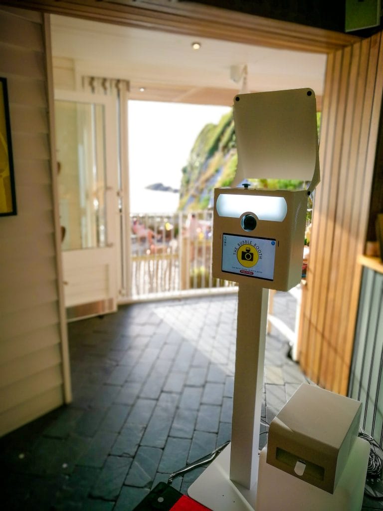 a white rectangular object with a screen on it