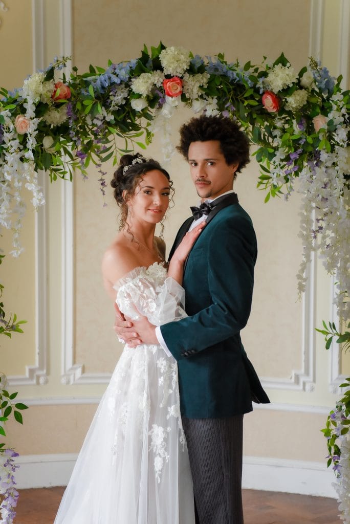 a man and woman in wedding attire