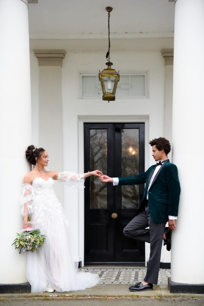 a man and woman holding hands