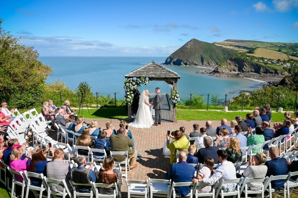 a couple getting married at a wedding ceremony