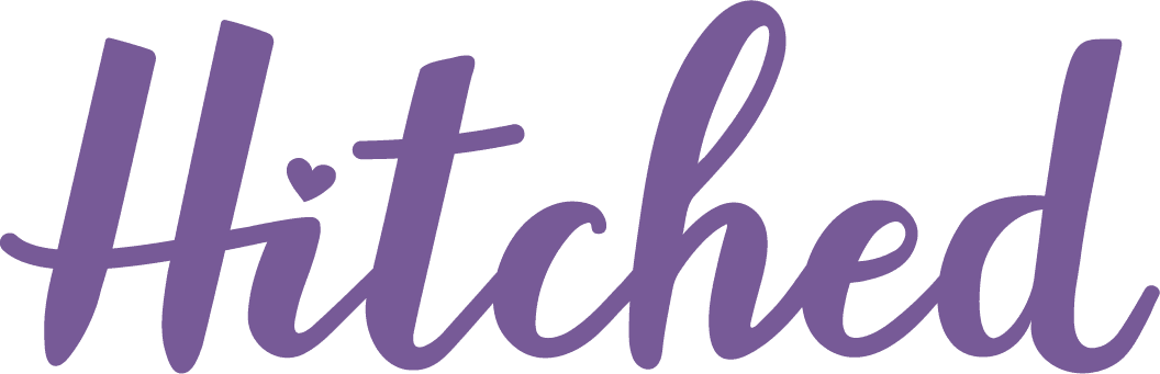 a purple letter on a black background